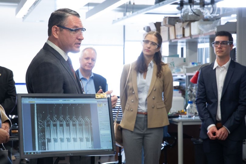 Image: Dr. Little discusses his research during a Lubrizol tour of Pitt.